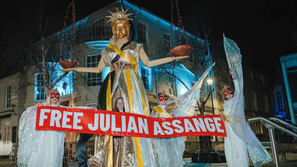 Thousands Hold 'Night Carnival' To Free Julian Assange 
