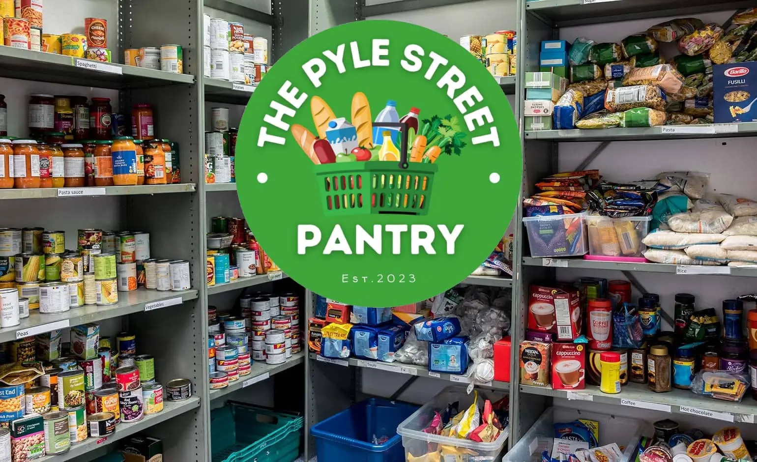 Ventnor Community Foodbank shelves filled with food and the Pyle St Pantry logo