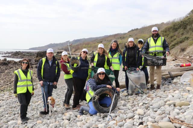 Red Funnel staff and Sarah Marshall at the beach clean