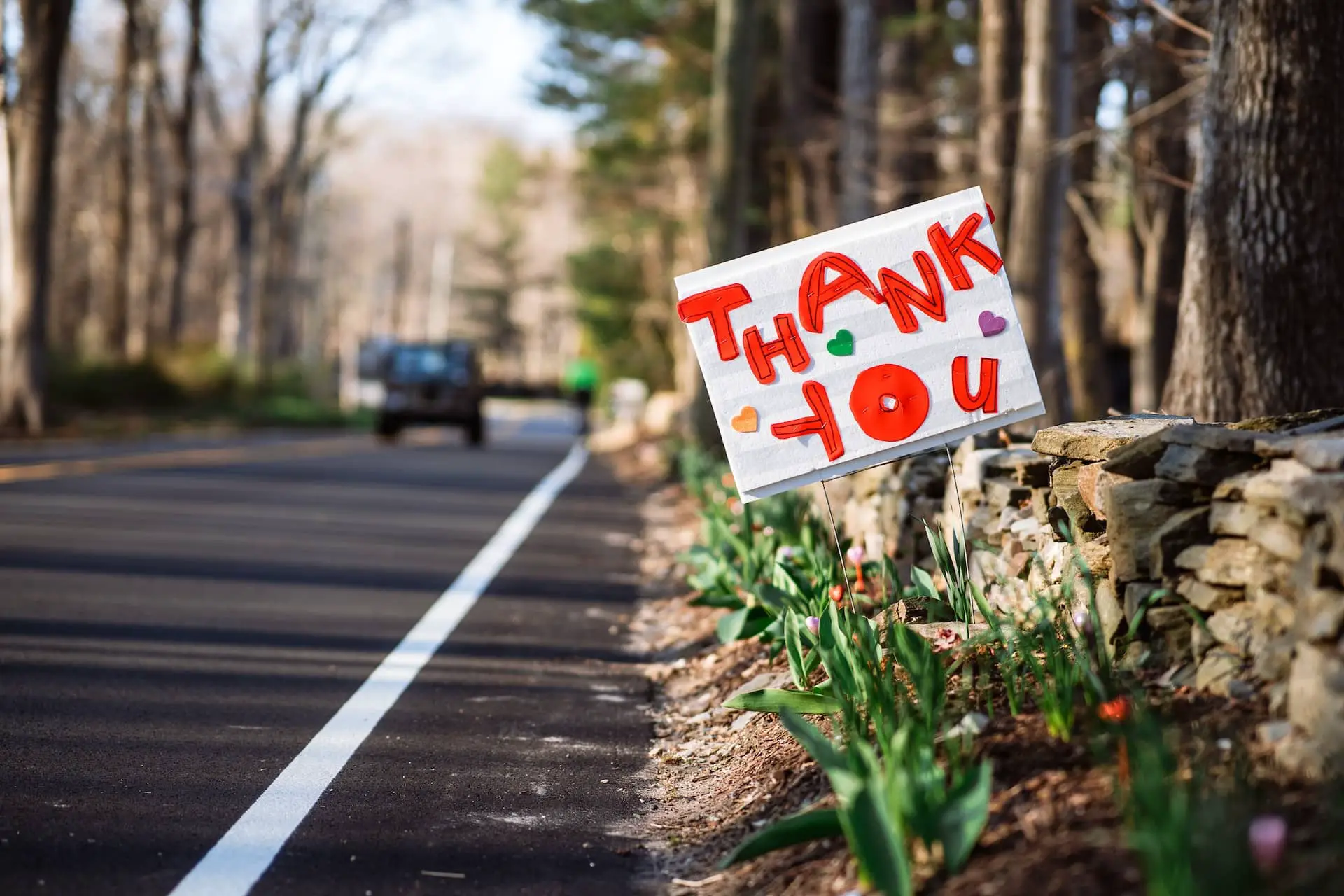 Handmade thank you sign at side of the road