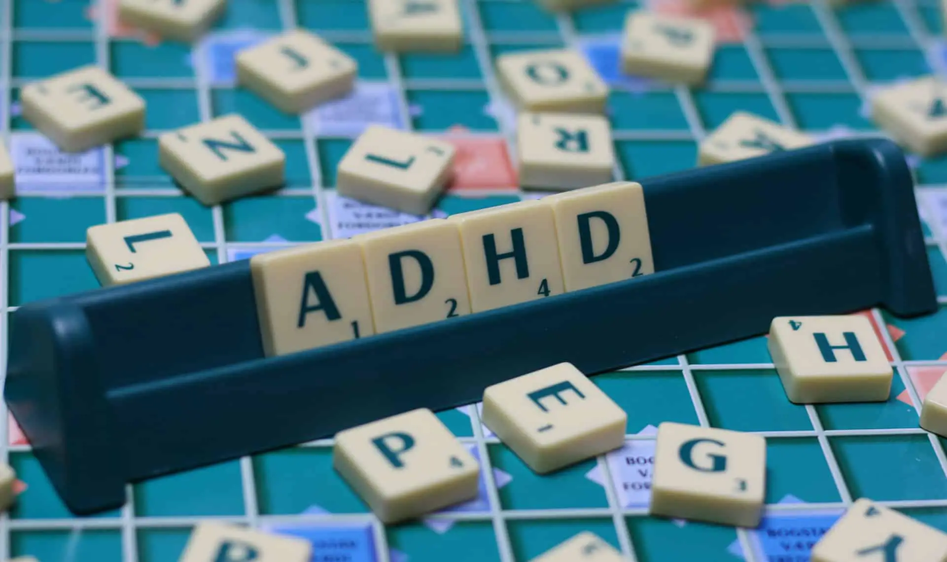 Scrabble letters spelling ADHD