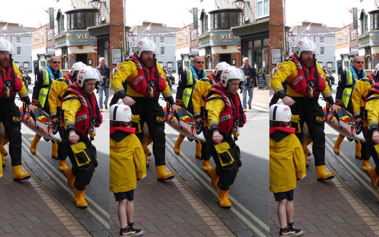 RNLI crew running through town on May Day by Nick Edwards