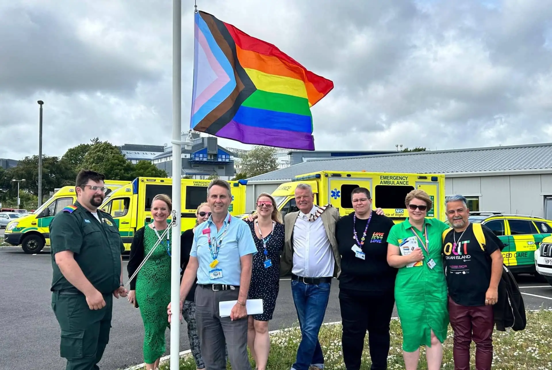 Karl Love and others at the Pride Flag raising for the Ambulance Service