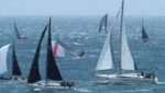 Yachts taking part in Round the Island pass Ventnor
