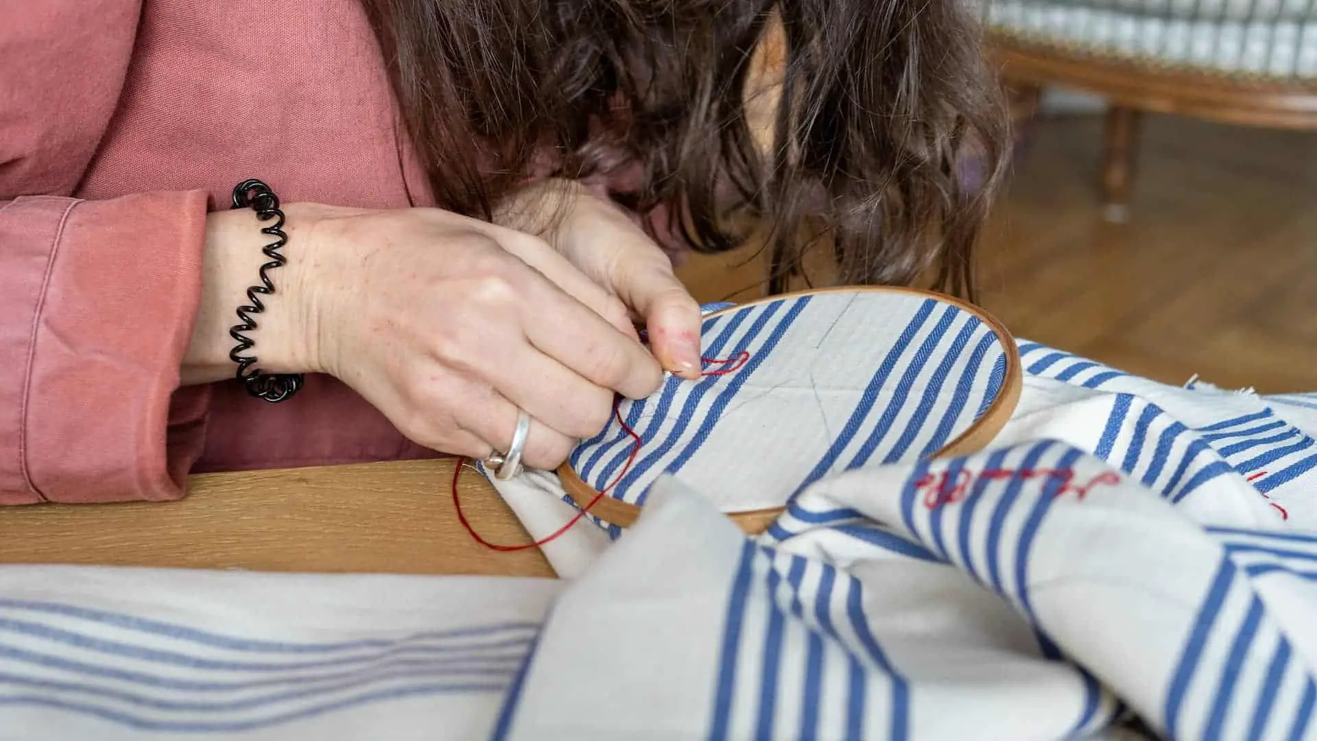 Person hand stitching