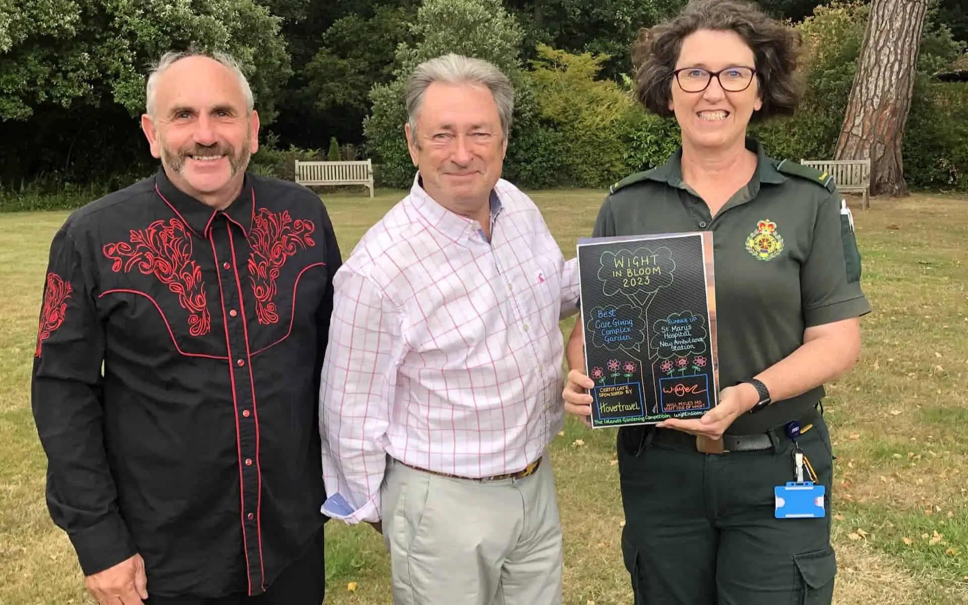 Steve Double, Alan Titchmarsh and Alison from IW Ambulance Service with their award