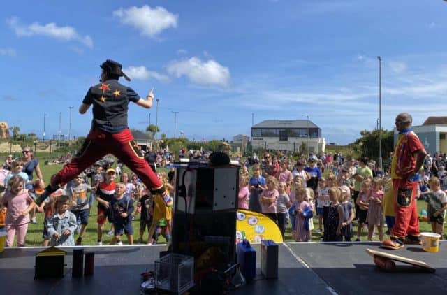 Stevo and Kai entertain the Children's Carnival at Sandham Gardens