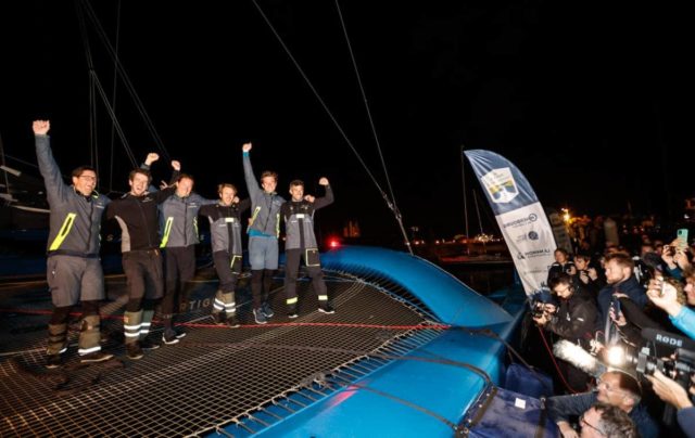 The crew of SVR Lazartigue having set the new multihull race record and finished first multihull overall