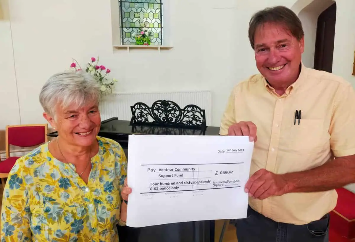 Michele Brock and Tony McCarthy with the cheque