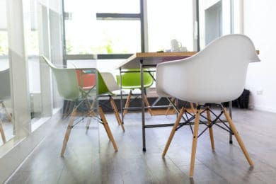 Chairs around a meeting table