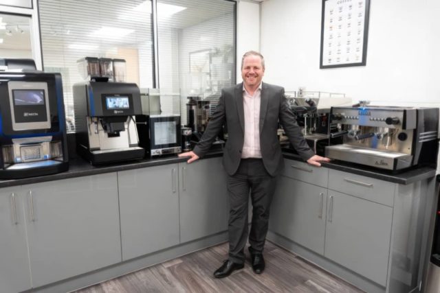 Jon Carter with some of the extensive range of coffee machines in the new demonstration area at The Island Tea and Coffee Co
