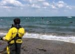 Ryde Rescue crew watching paddleboarders on the water