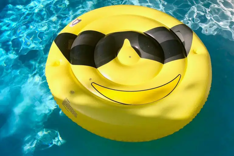 Smiley inflatable in swimming pool