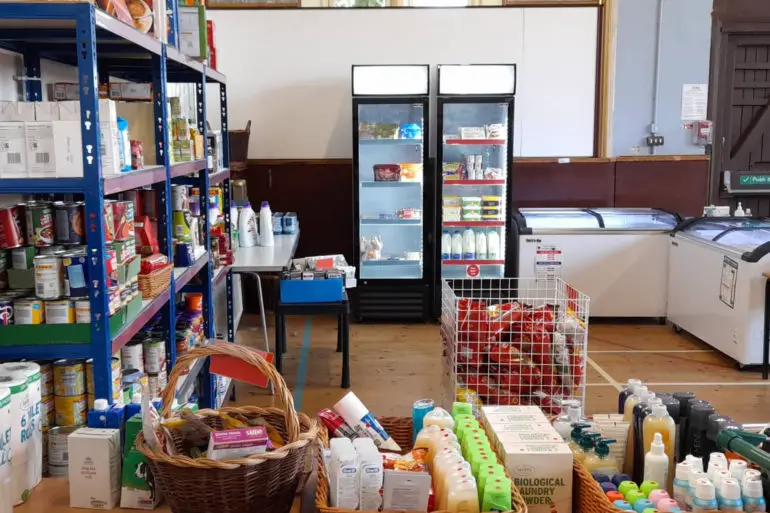 Ventnor Community Pantry - showing shelves of food and fridges full of food