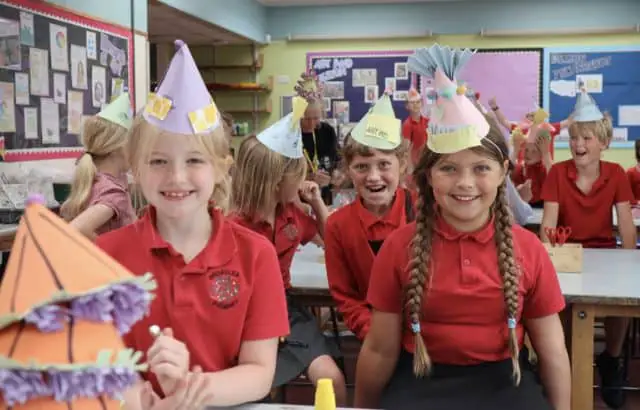 Year 4 pupils at Broadlea Primary showing off their Regatta seed paper hats