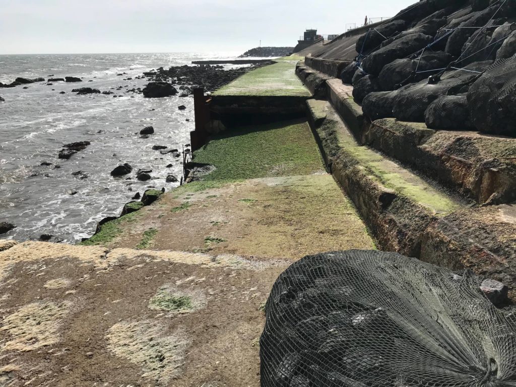 collapsed section of seawall