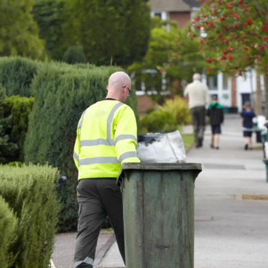 Amey staff member with bin