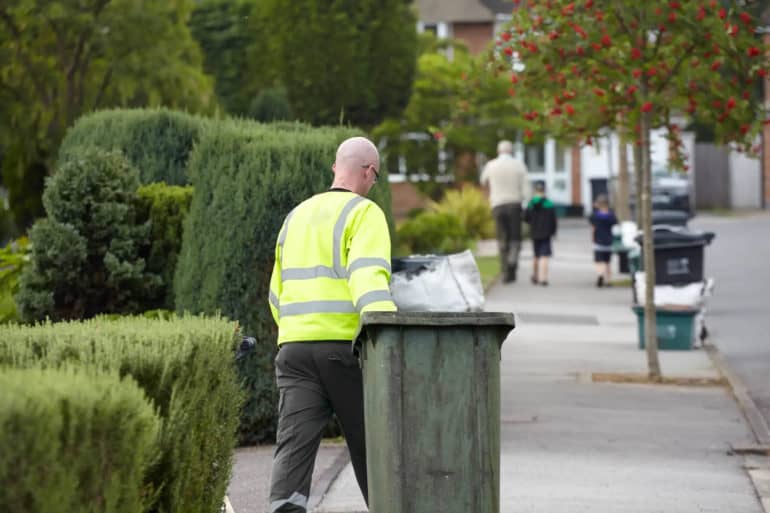 Amey staff member with bin