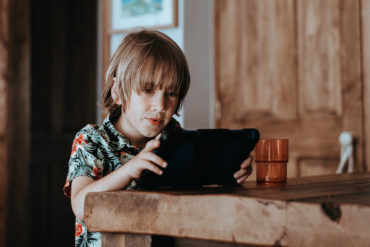 Child on tablet computer