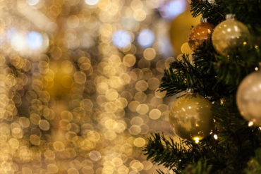 Gold lights and Christmas tree with gold decorations