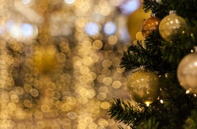 Gold lights and Christmas tree with gold decorations