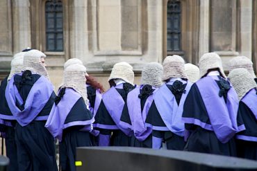 Judges lined up outside court
