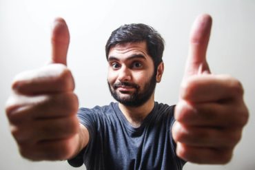 Man giving two thumbs up