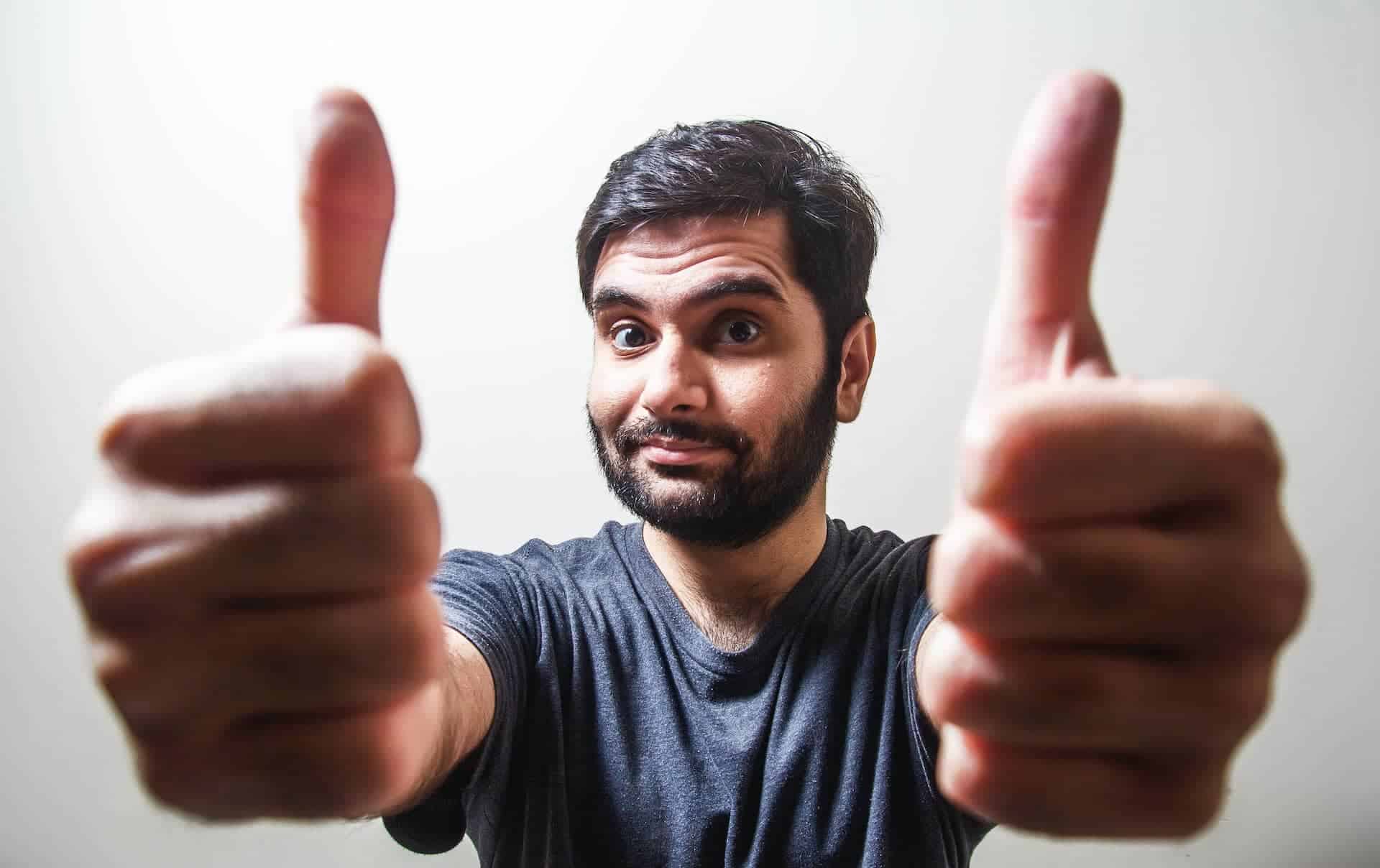 Man giving two thumbs up