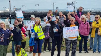 Members of the Wightlink users group protesting by the pier