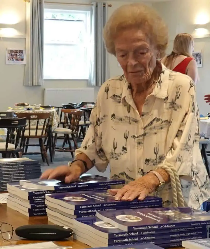 Pauline Harwood, 92, who was instrumental in ensuring the book was written, arrives first to buy a copy