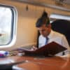 Prime Minister Rishi Sunak working on a train