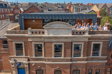 Spinlock HQ with staff on top floor terrace