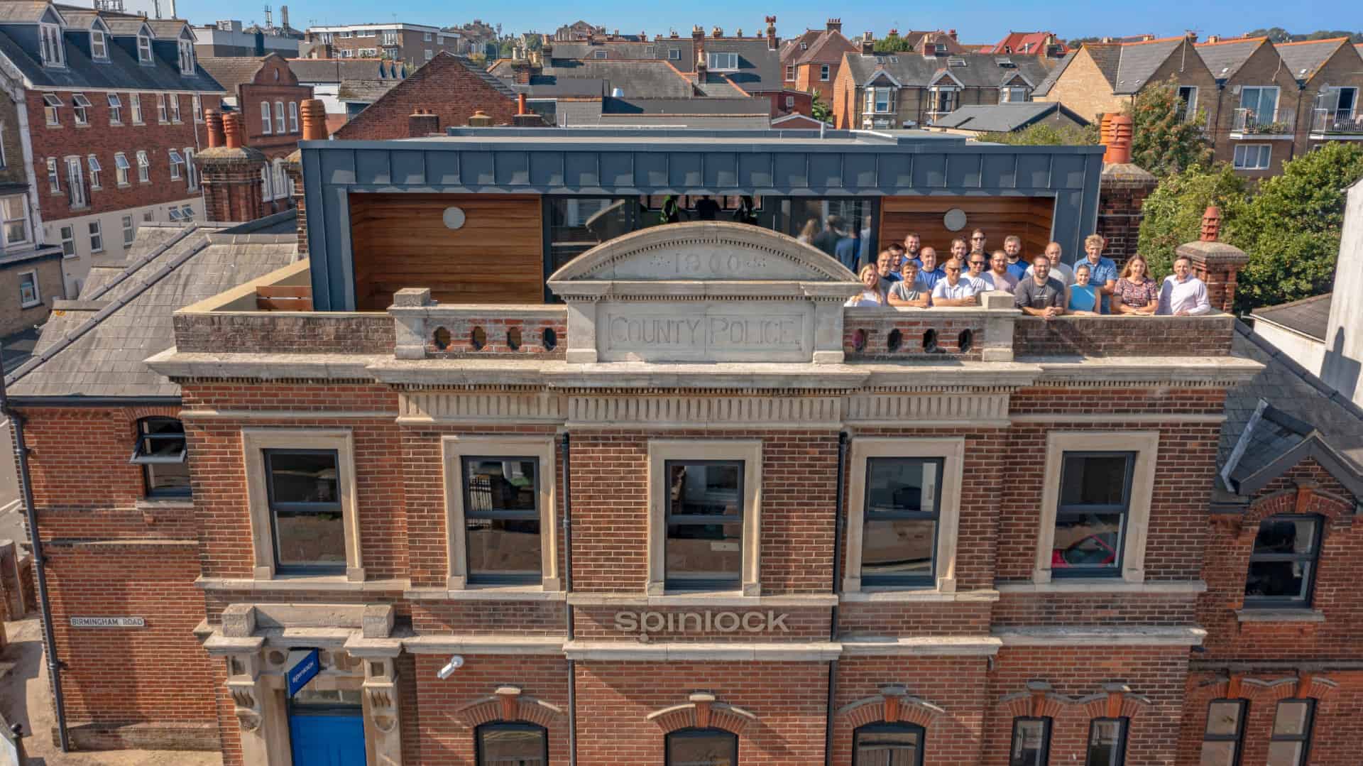 Spinlock HQ with staff on top floor terrace