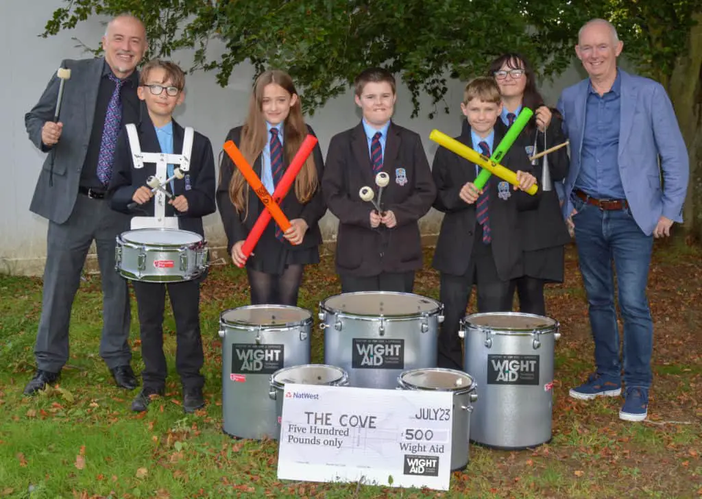 The Cove with their Samba Drums and Founder of WightAID Geoff Underwood