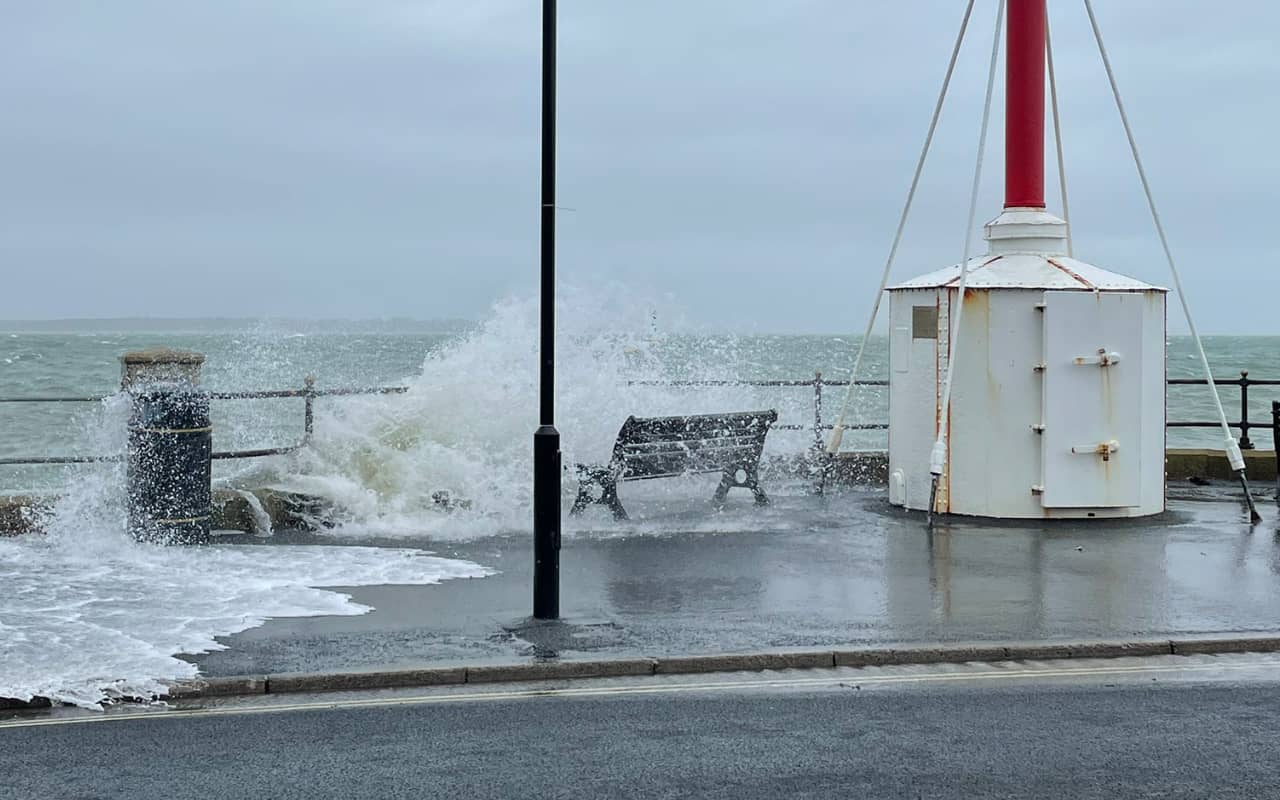 Water splashing over the seawall in Cowes