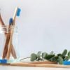 Bamboo toothbrushes in a jar