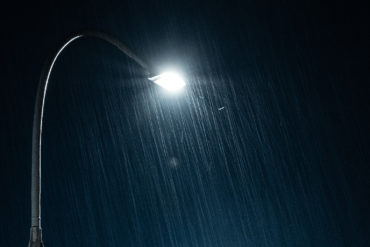 Night time rain street lamp