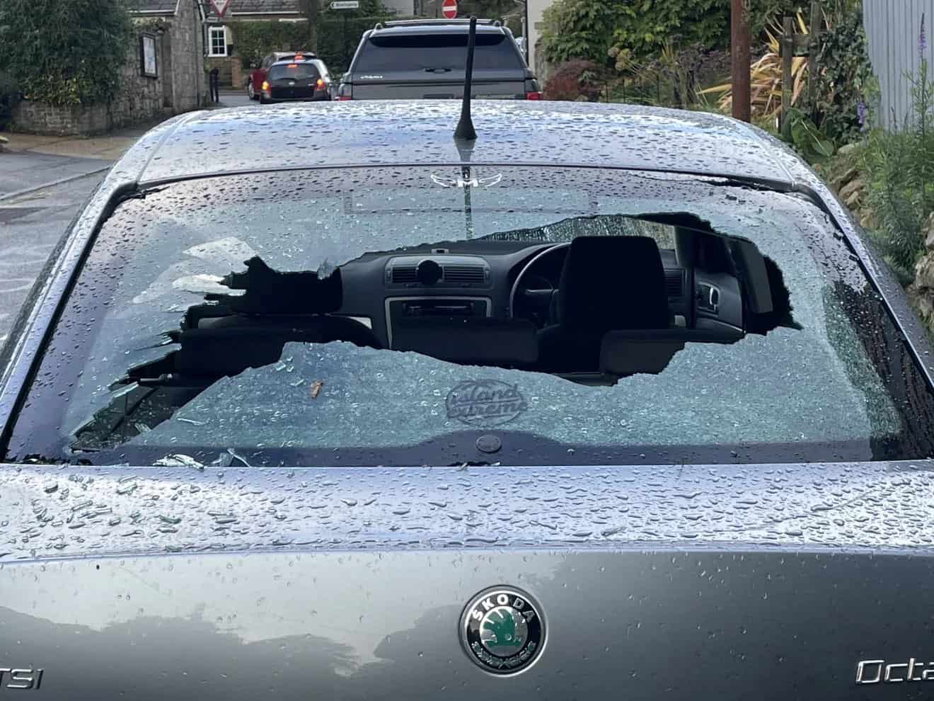 Cars in Niton with smashed windscreens