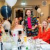 Huxley entertaining guests at Top Mops 25th anniversary event