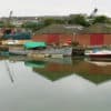 Photo of blackhouse quay warehouses from across the river