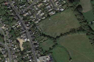 Aerial shot of the field where houses are planned new