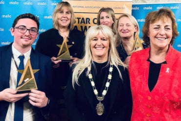 L/R Cllr Cameron Palin East Cowes Town Council, other category winners, Baroness Scott of Needham Market (red jacket)