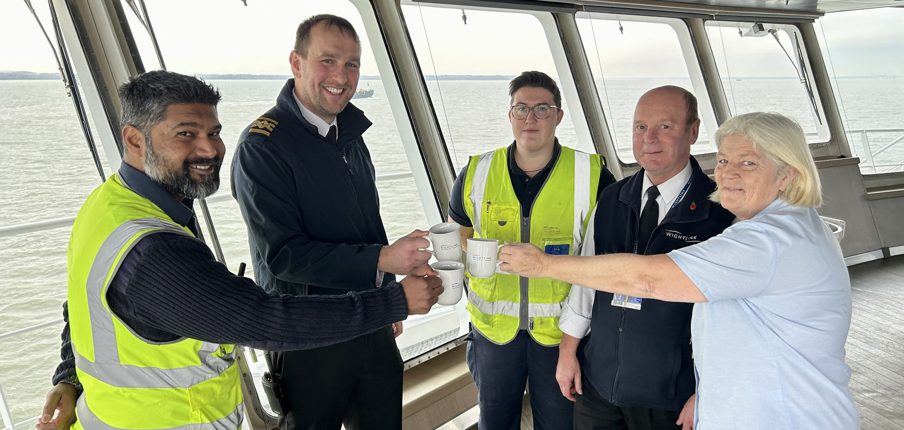 Victoria of Wight's crew toast Wightlink's Gold in the British Travel Awards