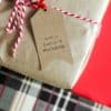 christmas present wrapped in brown paper with tag saying made in santas workshop