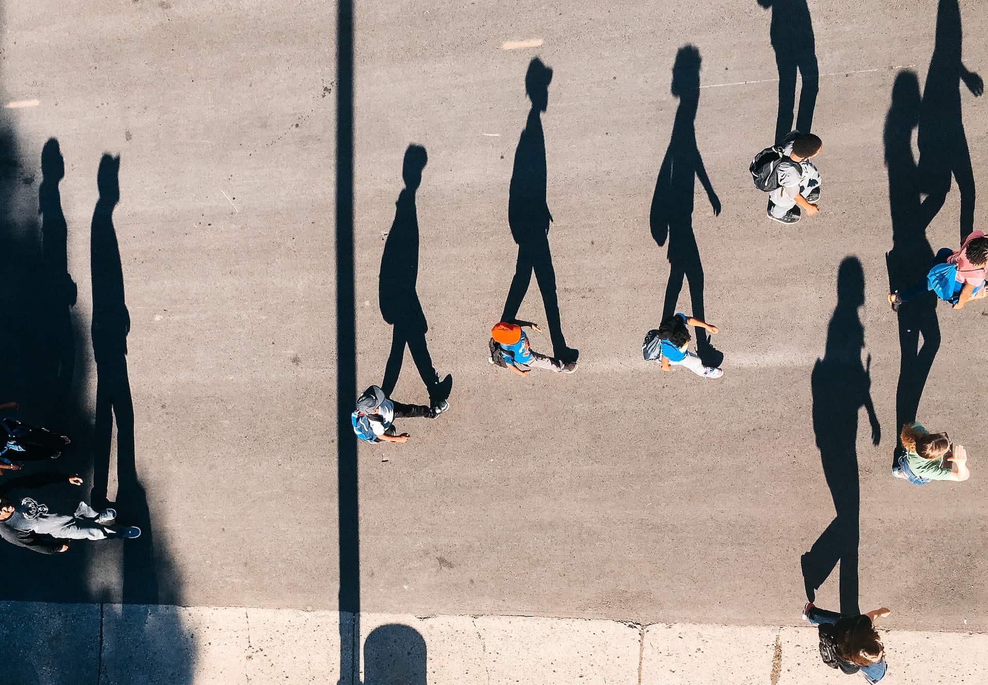 shadows of people walking