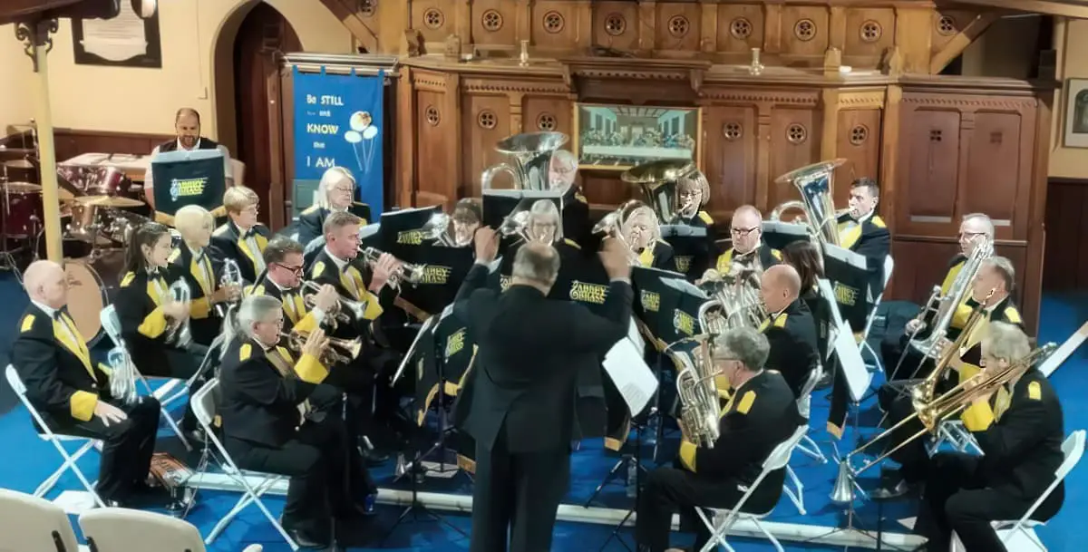 Abbey Brass playing in a church by Simon Smith