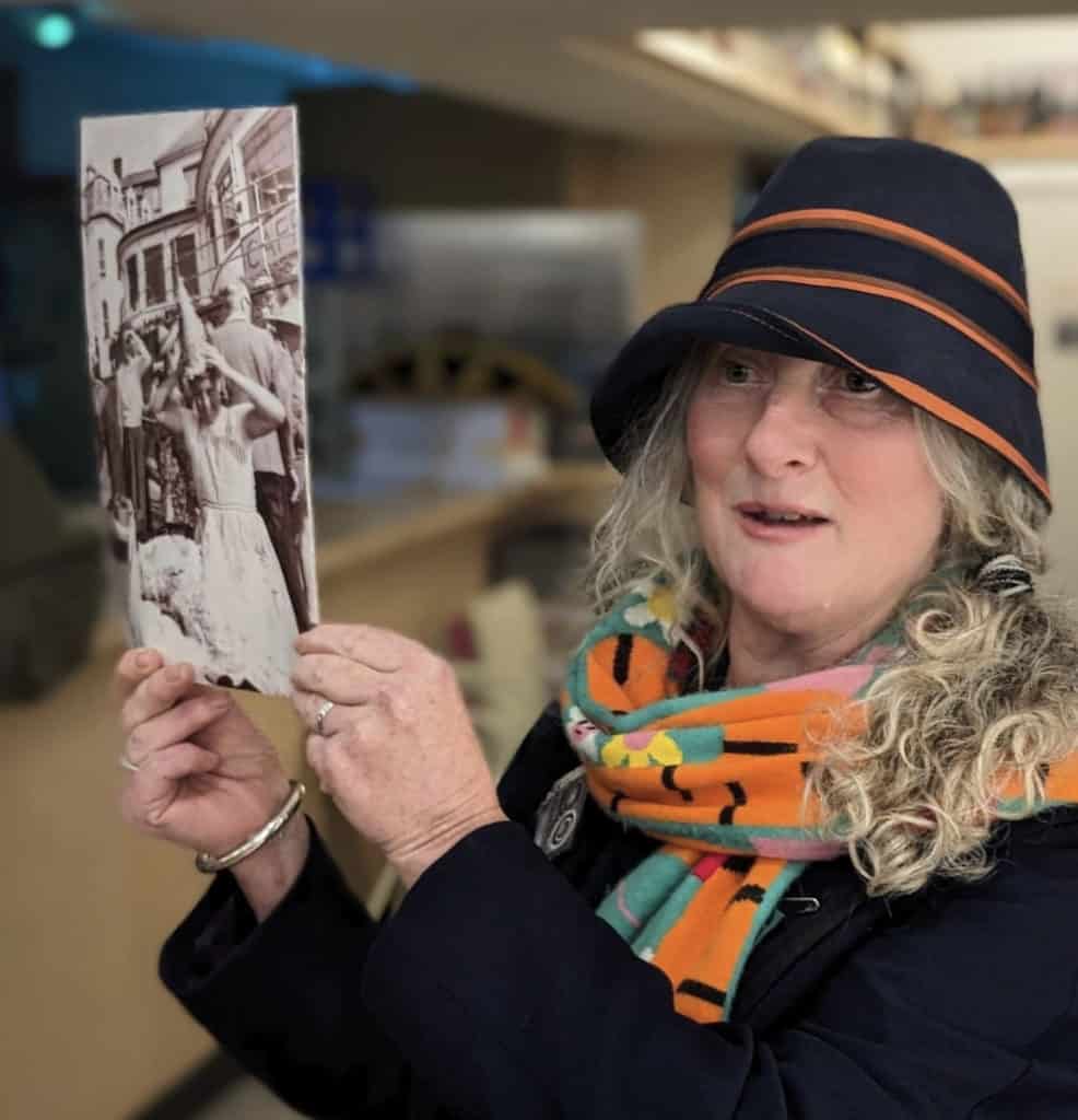 Artist Teresa Grimaldi shows her 1950s family photo which helped inspire Sandown's hat revival