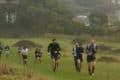 Runners taking on the Chilly Hilly Tennyson Climb in the mist