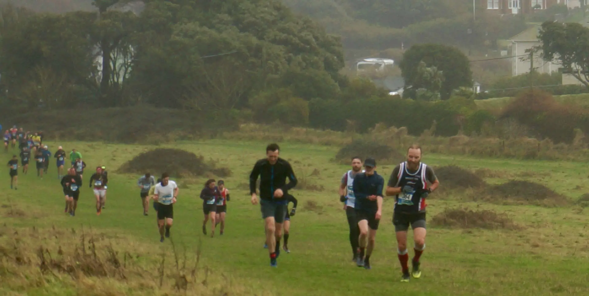 Runners taking on the Chilly Hilly Tennyson Climb in the mist