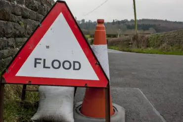 Flood sign on country road